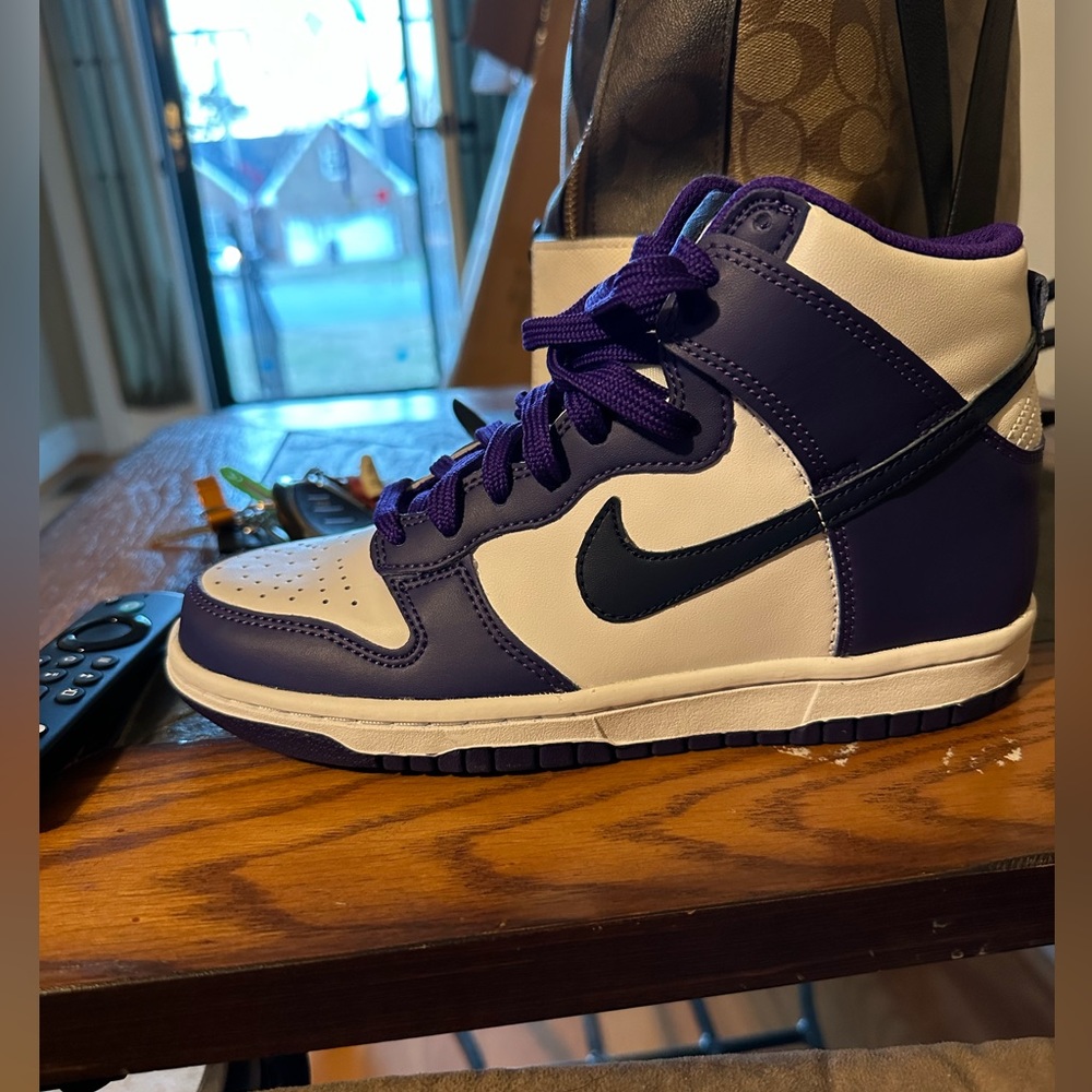 Purple white, and black dunks